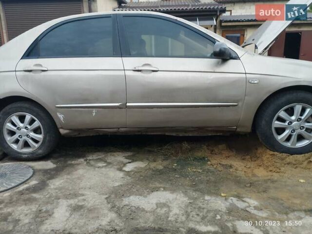 Бежевый Киа Черато, объемом двигателя 1.59 л и пробегом 208 тыс. км за 1900 $, фото 5 на Automoto.ua