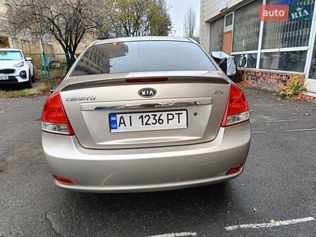 Бежевый Киа Черато, объемом двигателя 2 л и пробегом 195 тыс. км за 4250 $, фото 6 на Automoto.ua