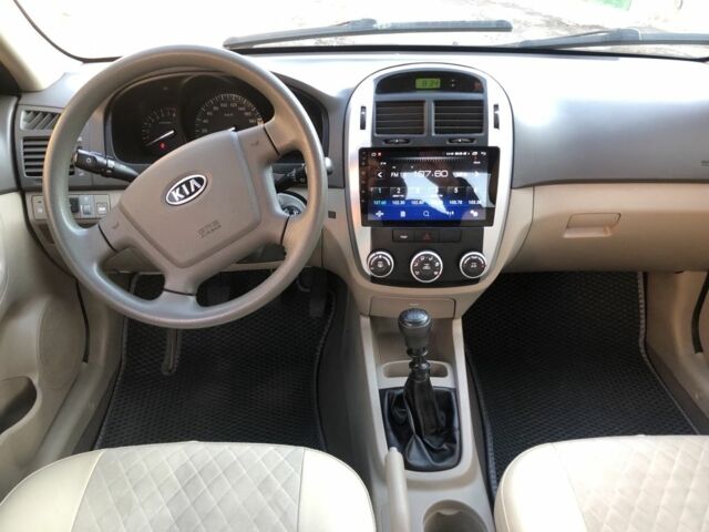 Бежевий Кіа Черато, об'ємом двигуна 1.6 л та пробігом 118 тис. км за 5300 $, фото 8 на Automoto.ua