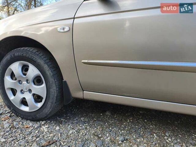 Бежевий Кіа Черато, об'ємом двигуна 1.59 л та пробігом 155 тис. км за 3700 $, фото 7 на Automoto.ua