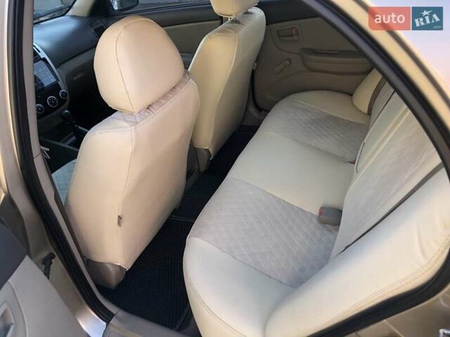 Бежевий Кіа Черато, об'ємом двигуна 1.6 л та пробігом 118 тис. км за 5400 $, фото 11 на Automoto.ua