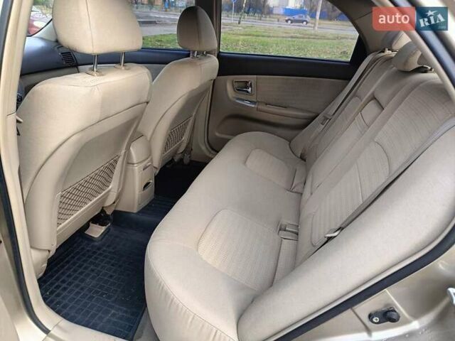 Бежевый Киа Черато, объемом двигателя 1.98 л и пробегом 195 тыс. км за 3993 $, фото 8 на Automoto.ua