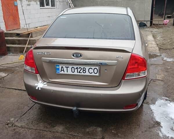 Бежевый Киа Черато, объемом двигателя 2 л и пробегом 245 тыс. км за 4500 $, фото 21 на Automoto.ua