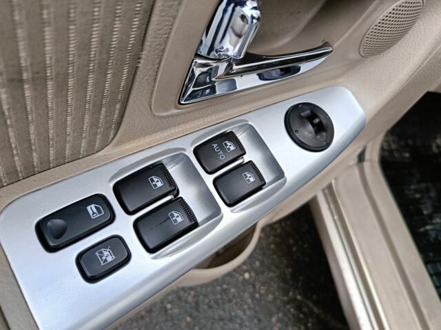 Бежевый Киа Черато, объемом двигателя 2 л и пробегом 195 тыс. км за 4250 $, фото 13 на Automoto.ua