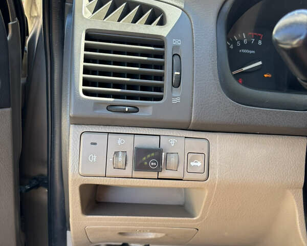 Бежевый Киа Черато, объемом двигателя 1.6 л и пробегом 193 тыс. км за 3400 $, фото 13 на Automoto.ua