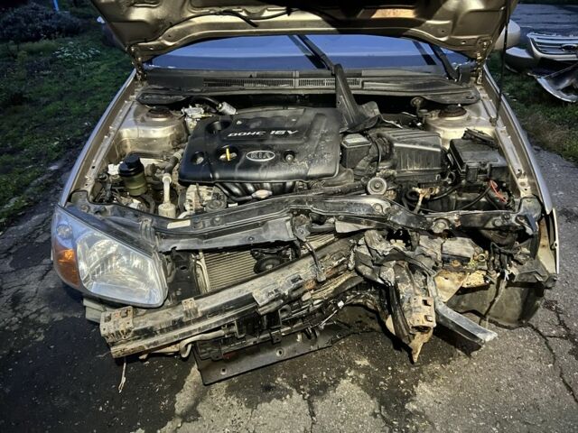 Бежевий Кіа Черато, об'ємом двигуна 1.6 л та пробігом 312 тис. км за 1800 $, фото 1 на Automoto.ua