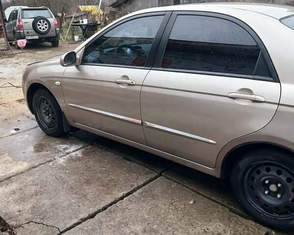 Бежевый Киа Черато, объемом двигателя 2 л и пробегом 245 тыс. км за 4500 $, фото 20 на Automoto.ua