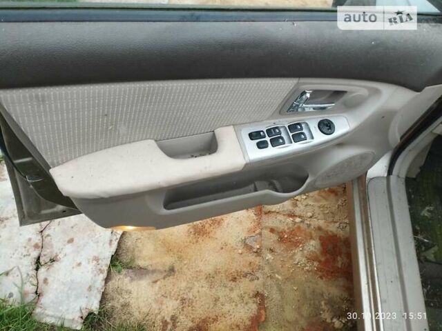 Бежевый Киа Черато, объемом двигателя 1.59 л и пробегом 208 тыс. км за 1900 $, фото 16 на Automoto.ua