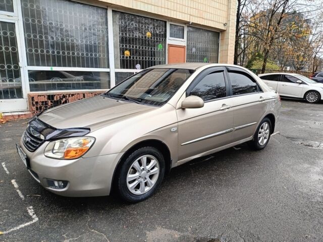 Бежевый Киа Черато, объемом двигателя 2 л и пробегом 195 тыс. км за 4250 $, фото 5 на Automoto.ua