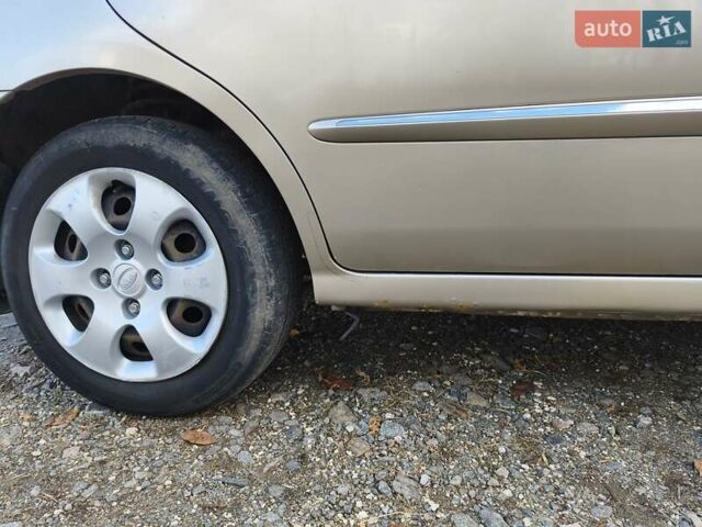 Бежевий Кіа Черато, об'ємом двигуна 1.59 л та пробігом 155 тис. км за 3700 $, фото 12 на Automoto.ua