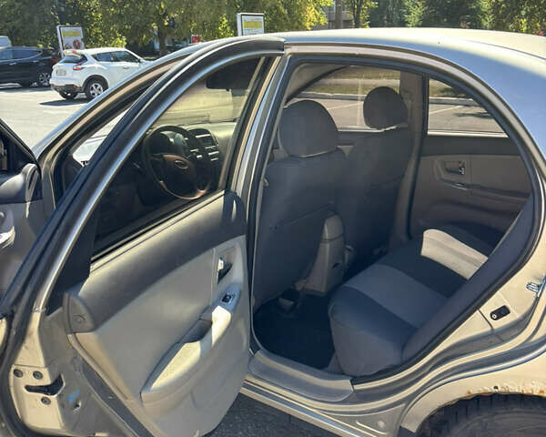 Бежевый Киа Черато, объемом двигателя 1.6 л и пробегом 193 тыс. км за 3400 $, фото 16 на Automoto.ua