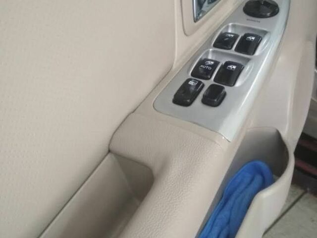 Бежевий Кіа Черато, об'ємом двигуна 2 л та пробігом 222 тис. км за 4900 $, фото 11 на Automoto.ua