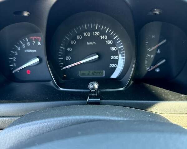 Бежевый Киа Черато, объемом двигателя 1.6 л и пробегом 212 тыс. км за 4650 $, фото 8 на Automoto.ua