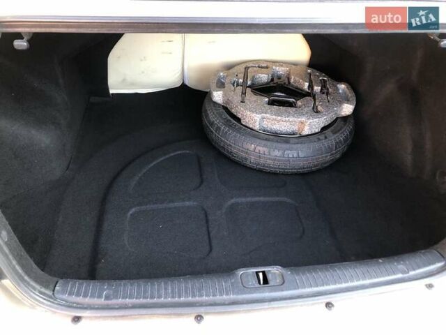 Бежевий Кіа Черато, об'ємом двигуна 1.6 л та пробігом 118 тис. км за 5400 $, фото 14 на Automoto.ua