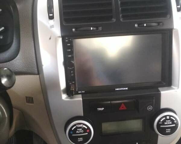 Бежевый Киа Черато, объемом двигателя 1.98 л и пробегом 222 тыс. км за 5200 $, фото 7 на Automoto.ua