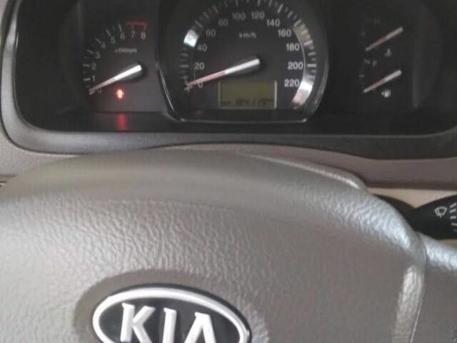 Бежевий Кіа Черато, об'ємом двигуна 2 л та пробігом 222 тис. км за 4900 $, фото 9 на Automoto.ua