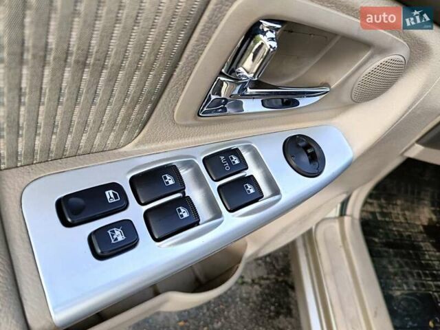 Бежевый Киа Черато, объемом двигателя 1.98 л и пробегом 195 тыс. км за 3993 $, фото 10 на Automoto.ua