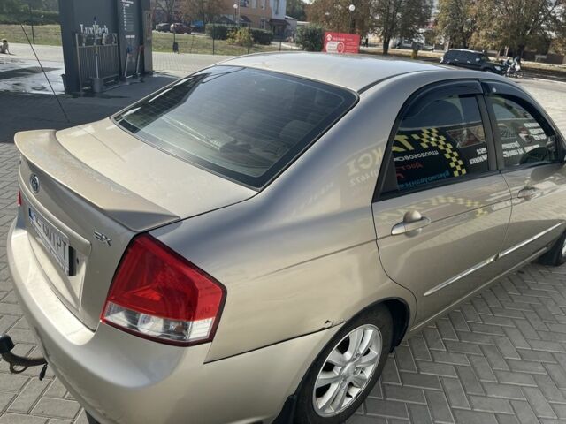 Бежевий Кіа Черато, об'ємом двигуна 1.6 л та пробігом 247 тис. км за 5100 $, фото 6 на Automoto.ua