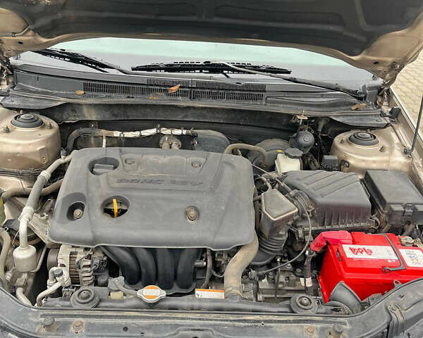 Бежевый Киа Черато, объемом двигателя 1.6 л и пробегом 182 тыс. км за 4000 $, фото 11 на Automoto.ua