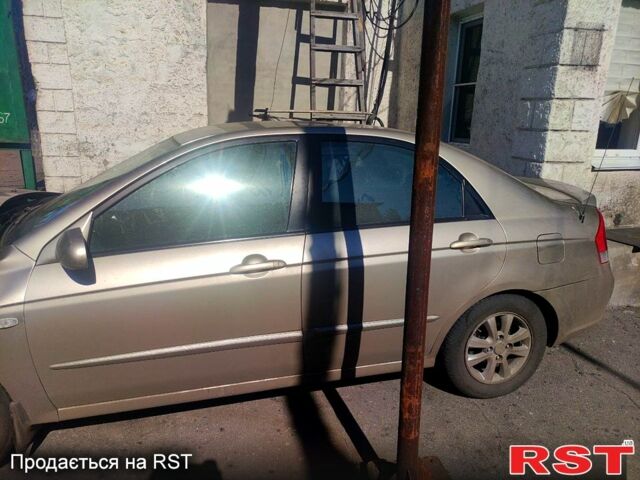 Бежевый Киа Черато, объемом двигателя 1.6 л и пробегом 240 тыс. км за 1600 $, фото 2 на Automoto.ua