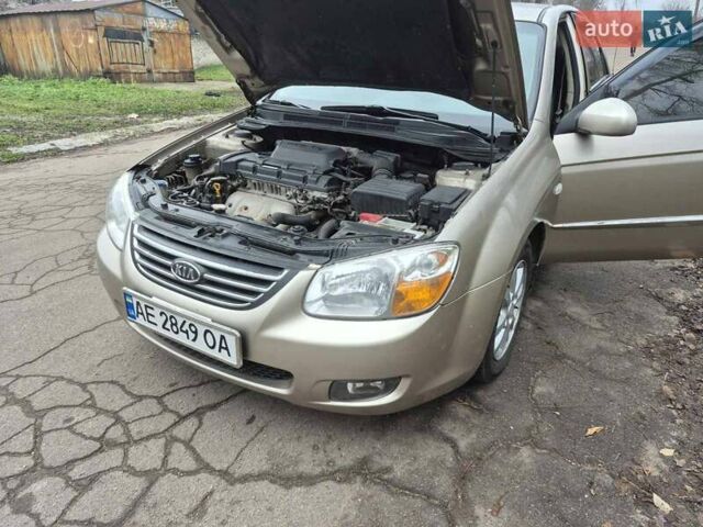 Бежевый Киа Черато, объемом двигателя 2 л и пробегом 210 тыс. км за 5300 $, фото 17 на Automoto.ua