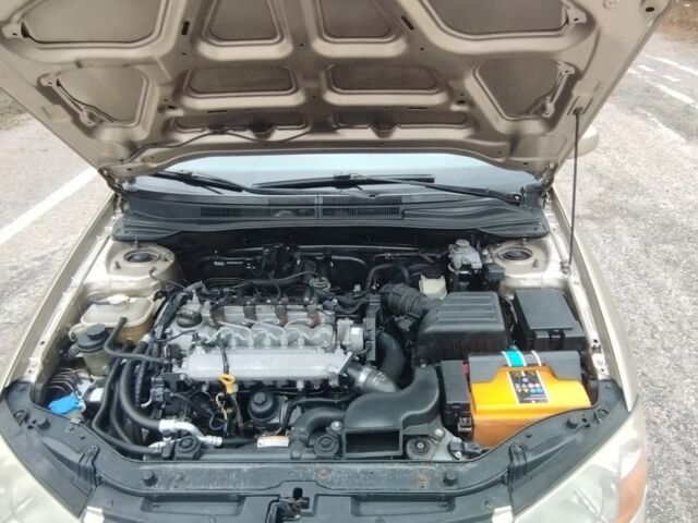 Бежевый Киа Черато, объемом двигателя 1.6 л и пробегом 305 тыс. км за 4500 $, фото 4 на Automoto.ua