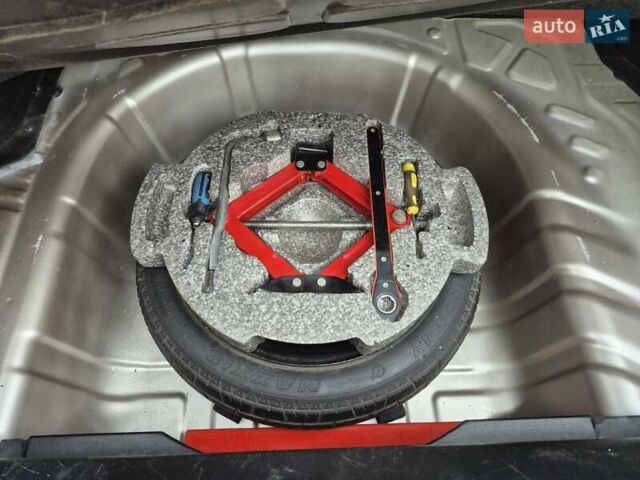 Бежевый Киа Черато, объемом двигателя 2 л и пробегом 210 тыс. км за 5300 $, фото 14 на Automoto.ua