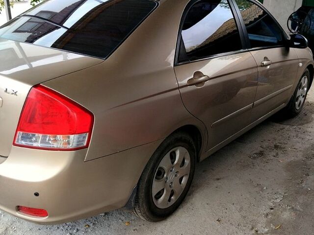 Бежевый Киа Черато, объемом двигателя 1.6 л и пробегом 118 тыс. км за 4300 $, фото 6 на Automoto.ua