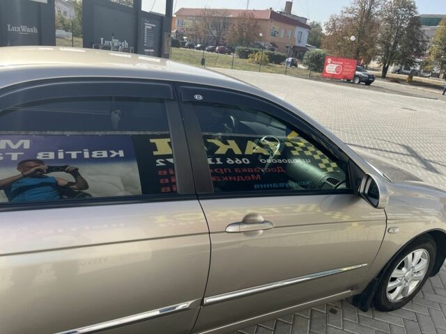 Бежевий Кіа Черато, об'ємом двигуна 1.6 л та пробігом 247 тис. км за 5100 $, фото 2 на Automoto.ua