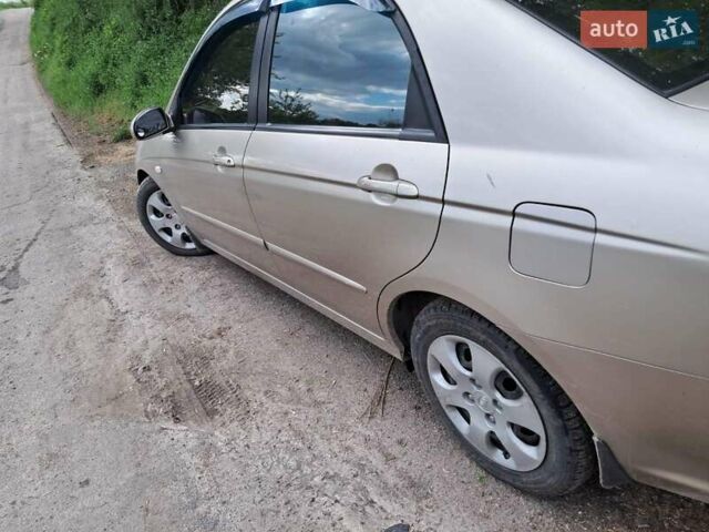 Бежевый Киа Черато, объемом двигателя 1.6 л и пробегом 220 тыс. км за 1700 $, фото 2 на Automoto.ua