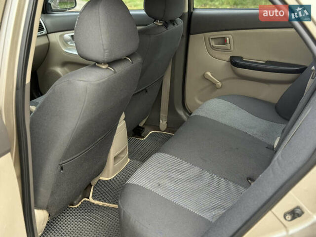 Бежевий Кіа Черато, об'ємом двигуна 1.58 л та пробігом 287 тис. км за 4800 $, фото 7 на Automoto.ua