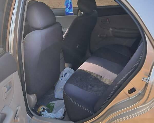 Бежевий Кіа Черато, об'ємом двигуна 1.6 л та пробігом 94 тис. км за 6300 $, фото 1 на Automoto.ua