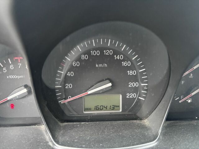 Бежевый Киа Черато, объемом двигателя 2 л и пробегом 160 тыс. км за 4500 $, фото 6 на Automoto.ua