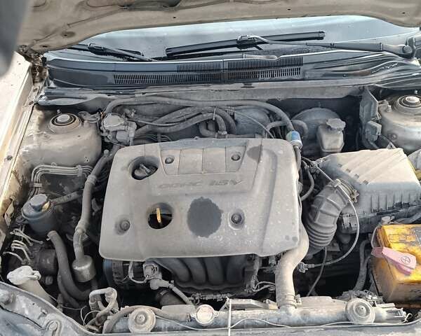 Бежевий Кіа Черато, об'ємом двигуна 1.6 л та пробігом 205 тис. км за 4600 $, фото 10 на Automoto.ua