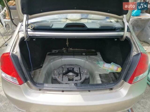 Кіа Черато 2008 у Ужгороді на Automoto.ua Бежевий Кіа Черато, об'ємом двигуна 1.59 л та пробігом 184 тис. км за 4500 $, фото 9 на Automoto.ua