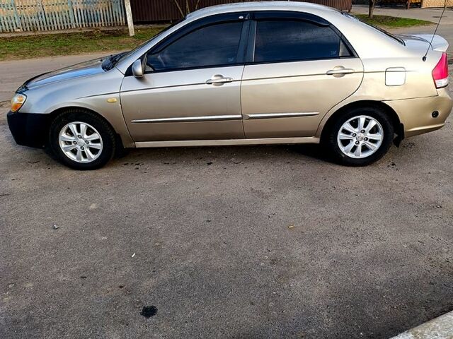 Бежевий Кіа Черато, об'ємом двигуна 1.6 л та пробігом 205 тис. км за 4600 $, фото 6 на Automoto.ua