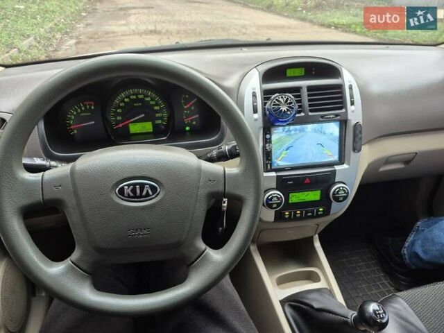 Бежевый Киа Черато, объемом двигателя 2 л и пробегом 210 тыс. км за 5300 $, фото 8 на Automoto.ua