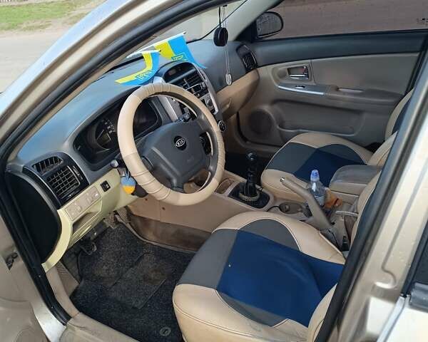 Бежевий Кіа Черато, об'ємом двигуна 1.6 л та пробігом 205 тис. км за 4600 $, фото 9 на Automoto.ua