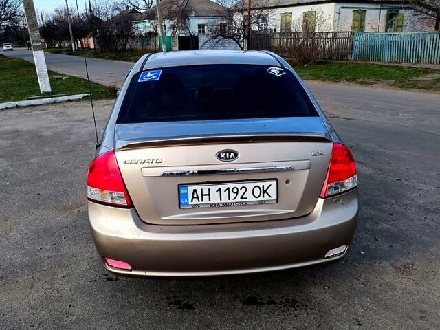 Бежевий Кіа Черато, об'ємом двигуна 1.6 л та пробігом 205 тис. км за 4600 $, фото 7 на Automoto.ua