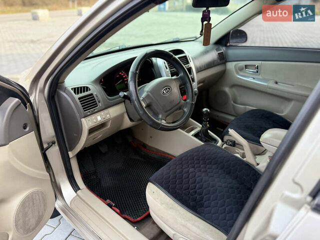 Бежевый Киа Черато, объемом двигателя 1.6 л и пробегом 335 тыс. км за 3800 $, фото 24 на Automoto.ua