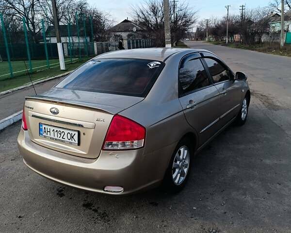 Бежевий Кіа Черато, об'ємом двигуна 1.6 л та пробігом 205 тис. км за 4600 $, фото 6 на Automoto.ua