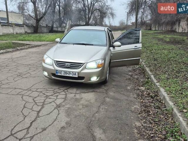 Бежевый Киа Черато, объемом двигателя 2 л и пробегом 210 тыс. км за 5300 $, фото 5 на Automoto.ua