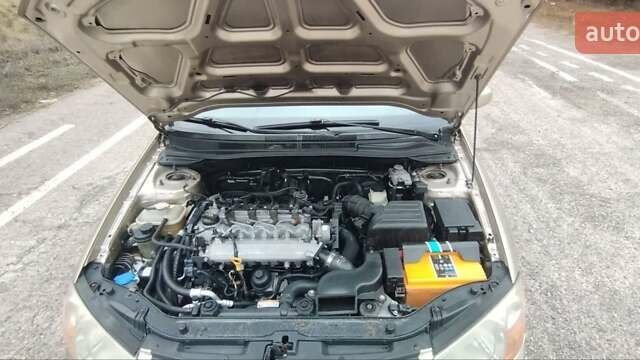 Бежевый Киа Черато, объемом двигателя 1.6 л и пробегом 305 тыс. км за 4500 $, фото 6 на Automoto.ua