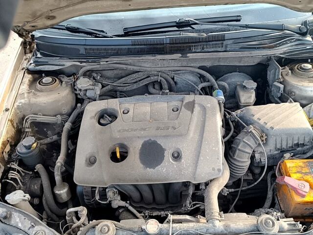 Бежевий Кіа Черато, об'ємом двигуна 1.6 л та пробігом 205 тис. км за 4600 $, фото 12 на Automoto.ua