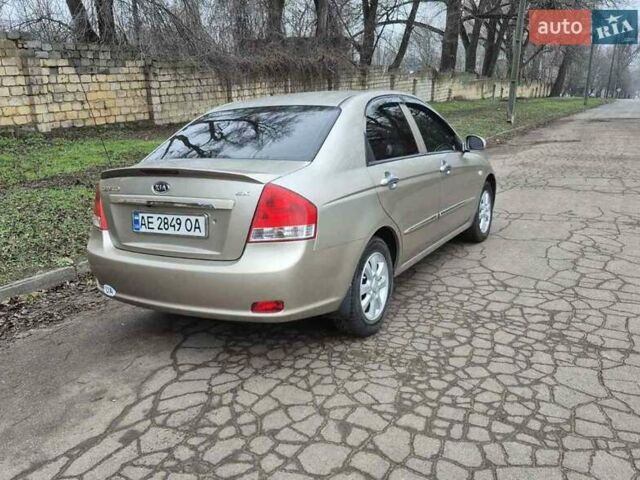 Бежевый Киа Черато, объемом двигателя 2 л и пробегом 210 тыс. км за 5300 $, фото 6 на Automoto.ua