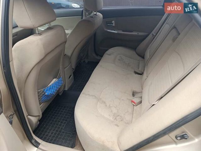 Бежевий Кіа Черато, об'ємом двигуна 1.6 л та пробігом 215 тис. км за 4000 $, фото 4 на Automoto.ua