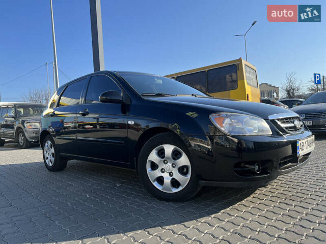 Черный Киа Черато, объемом двигателя 1.6 л и пробегом 150 тыс. км за 4499 $, фото 3 на Automoto.ua