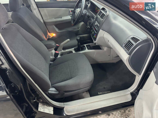 Киа Черато 2006 в Кременце на Automoto.ua Черный Киа Черато, объемом двигателя 1.6 л и пробегом 132 тыс. км за 4600 $, фото 14 на Automoto.ua