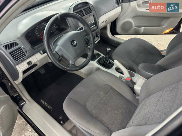 Киа Черато 2006 в Кременце на Automoto.ua Черный Киа Черато, объемом двигателя 1.6 л и пробегом 132 тыс. км за 4600 $, фото 13 на Automoto.ua