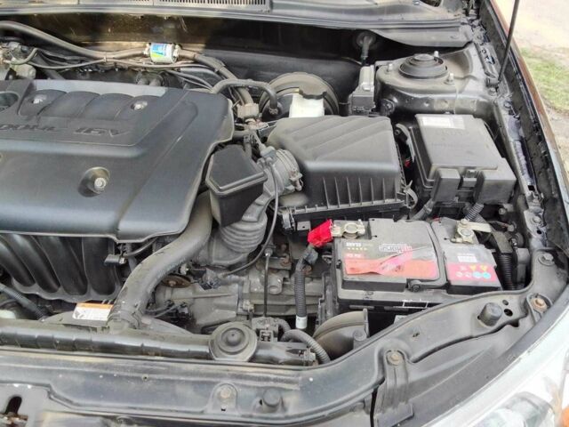 Черный Киа Черато, объемом двигателя 1.6 л и пробегом 213 тыс. км за 5000 $, фото 5 на Automoto.ua